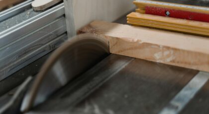 Focused image of a circular saw cutting through timber, highlighting woodworking craftsmanship.