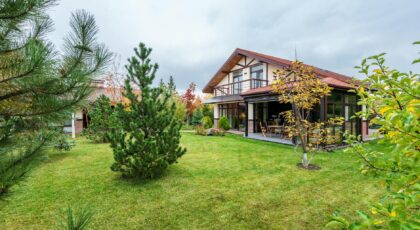 Charming suburban residence with lush greenery and a spacious yard, ideal for a tranquil lifestyle.