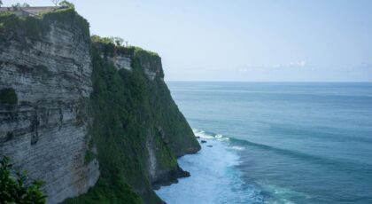 Breathtaking view of Uluwatu Cliffs meeting the Indian Ocean in Bali, Indonesia.