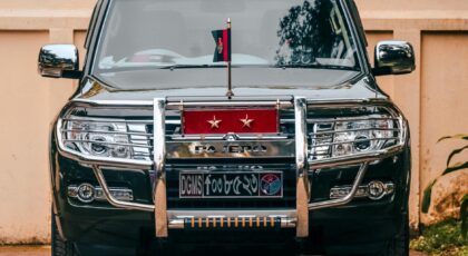 Front view of a luxury black SUV parked in Dhaka, showcasing design and elegance.